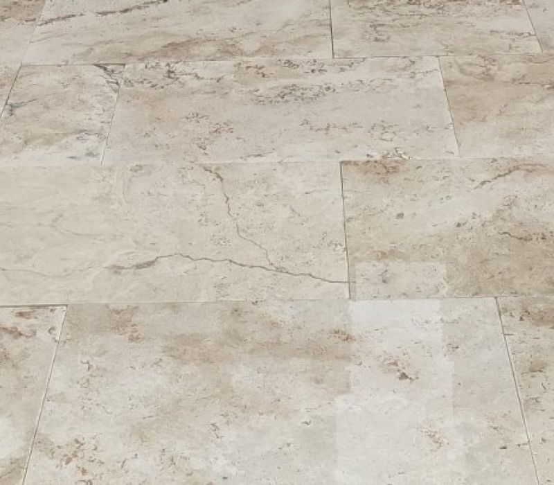 Cream travertine with cinnamon color swirls with lots of movement