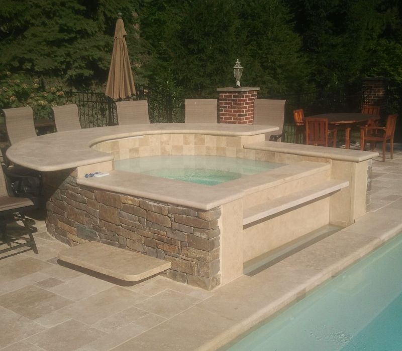 caramel-travertine pool and spa coping