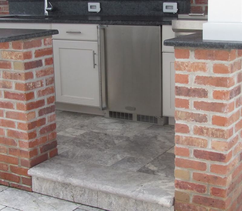 silver travertine brick outdoor kitchen