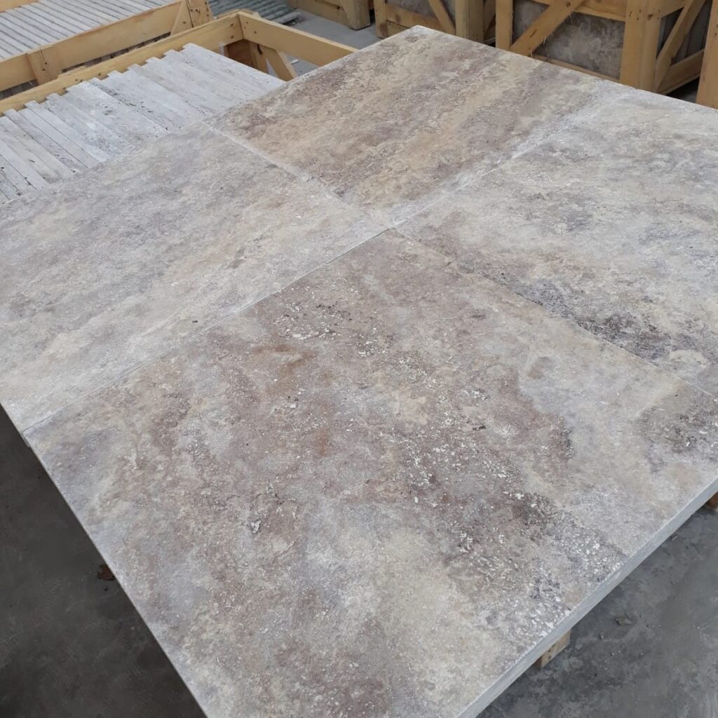 Silver travertine Toadflax selection 24"x24" pavers - mix of silver, grey, cream and beige.  