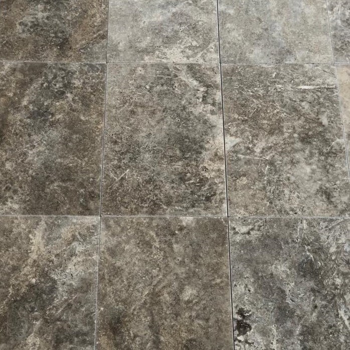 Dark grey and silver travertine