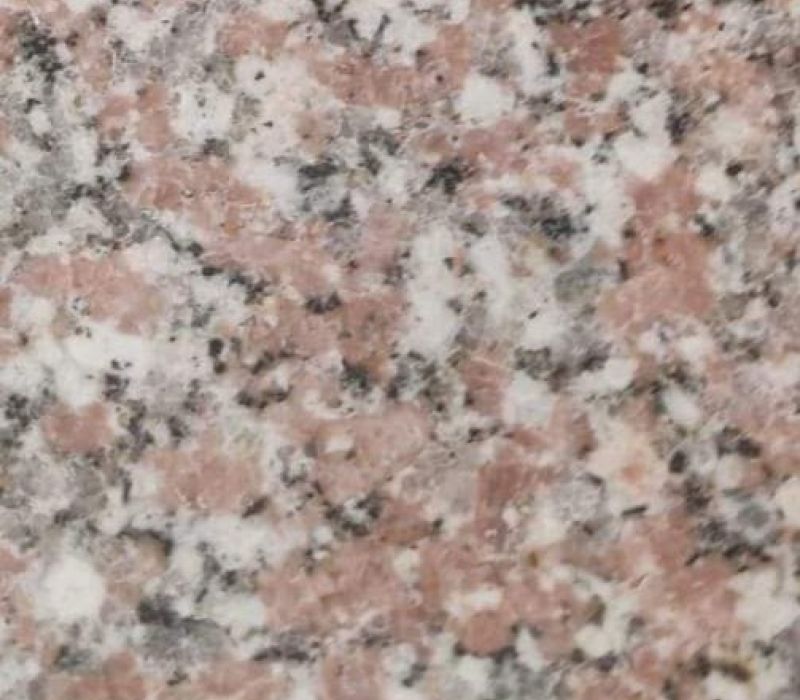 Tangier #14 is a reddish brown, gray, white speckled granite