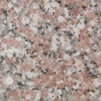 Tangier #14 is a reddish brown, gray, white speckled granite